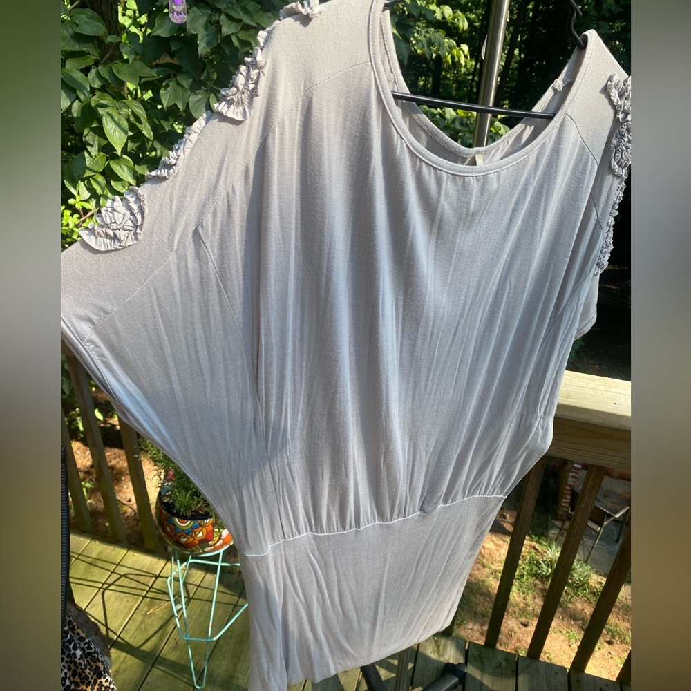 Karma.  What goes around comes around.  Style is cool.  Bella d.  size medium.